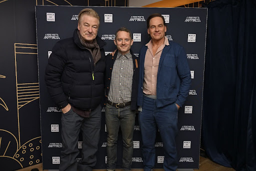 (left to right) Alec Baldwin, Elijah Wood and Darin Olien pictured at the “A Road To Happiness” panel at the 2026 Sundance Film Festival. (Courtesy David Becker/Getty)